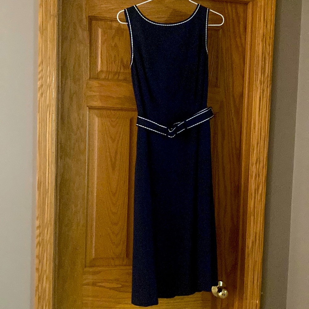 Women’s Navy dress with white stitch detail.  Size 4